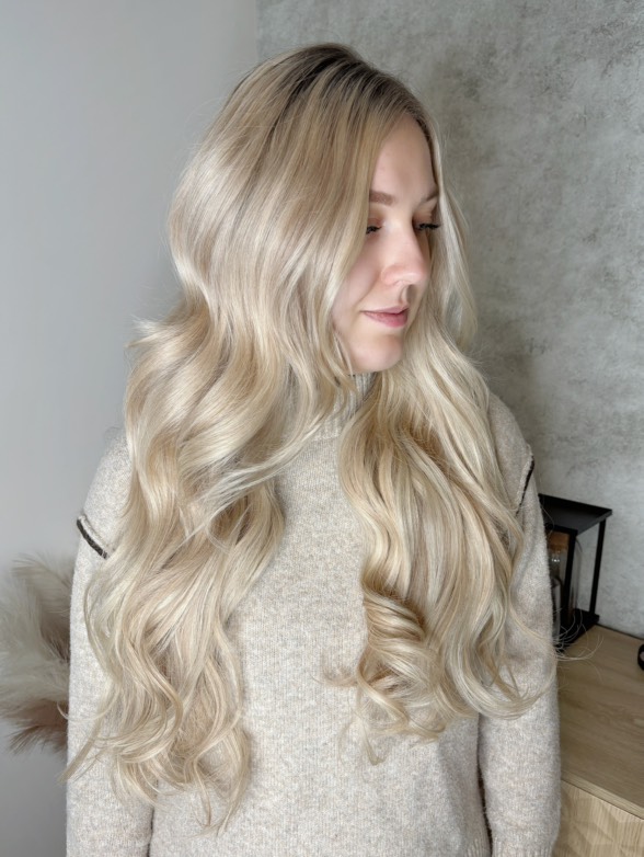 Voluminous brown hair with nano extensions.